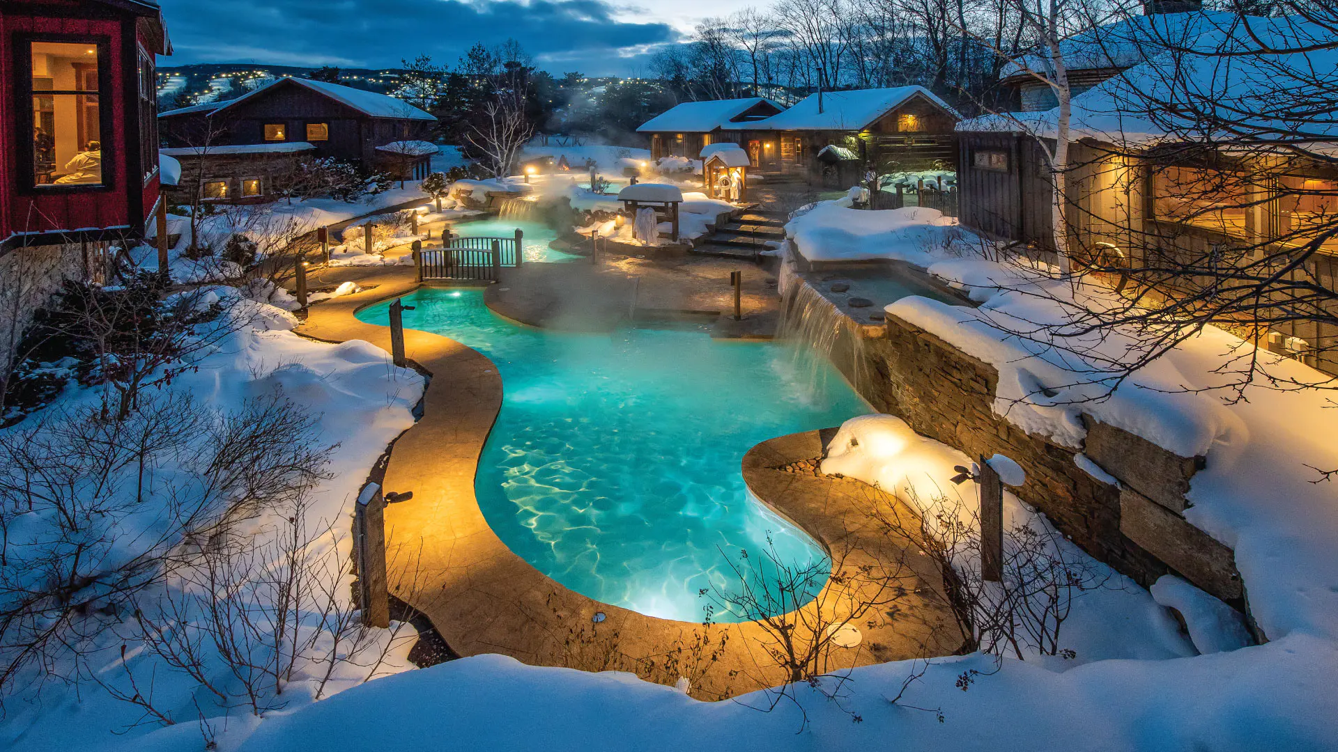 Overhead view of Scandinave Spa's baths in the Winter